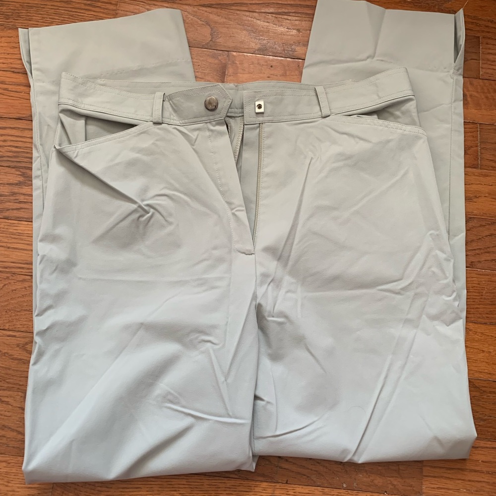 Pale mint green athletic material dress pants. Size 4 fits true to size.